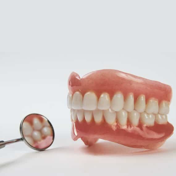 Bellevue dentist may reline your denture base so that it fits comfortably against your gums. Contact us if you need to reline your dentures.